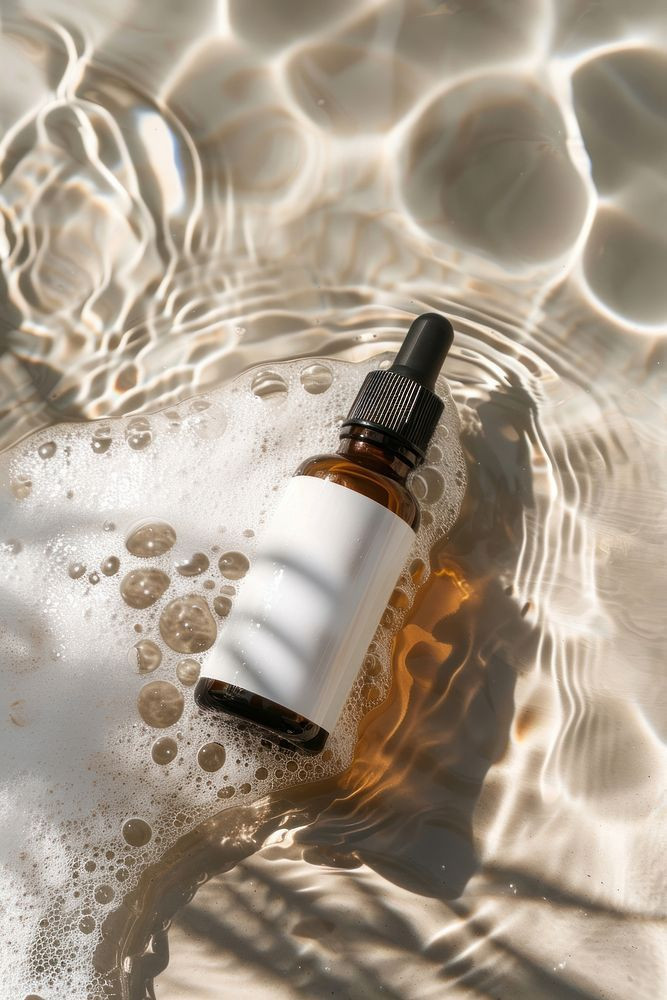 download-free-image-of-serum-skincare-packaging-mockup-bottle-cosmetics-perfume-by-benjamas-about-aesthetic-sea-water-nature-and-sunlight-14569514.jpeg
