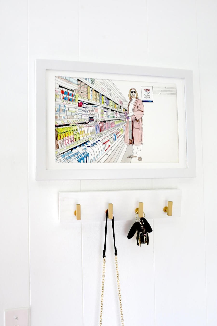 gold-wall-hooks-with-big-lebowski-artwork.jpg