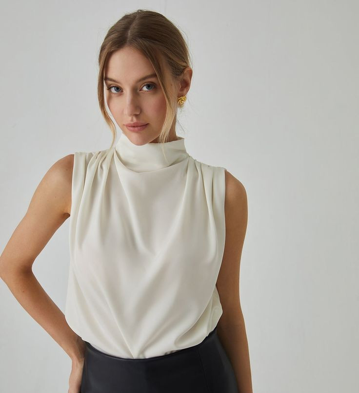 pleated-high-neck-sleeveless-blouse.jpg