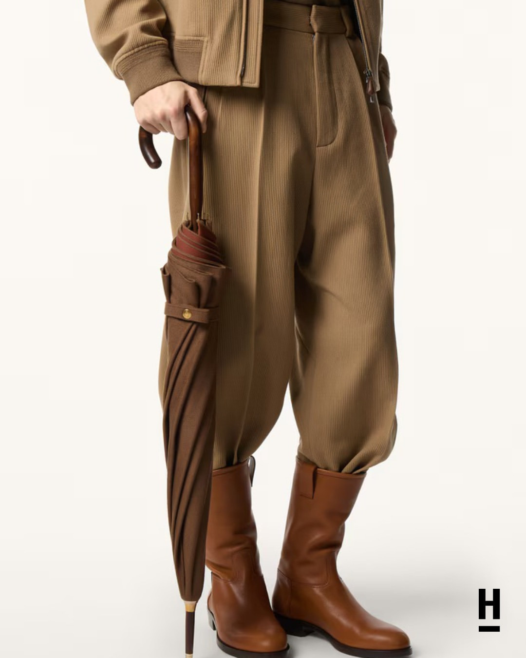 a-cashmere-umbrella-sounds-like-a-punchline-until-you-learn-at-loropiana-designed-it-for-actual-ra.jpg