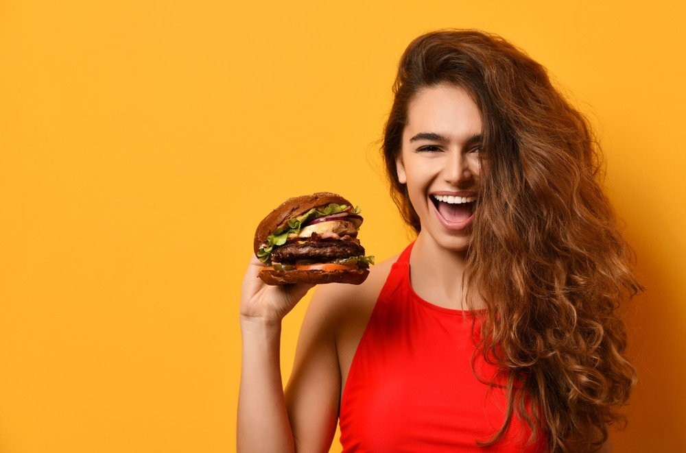 girl-burger-shutterstock-1199098651.jpg