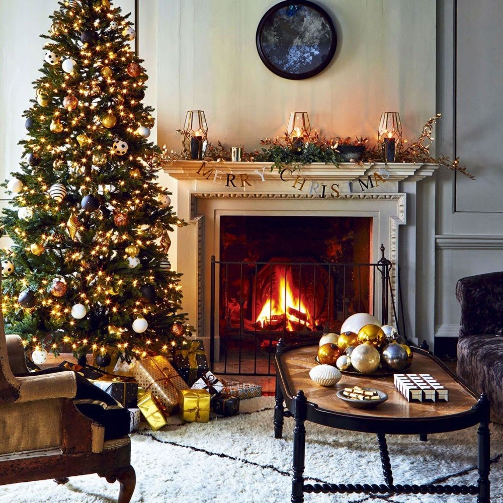classic-christmas-living-room-with-tree-and-garland.jpg