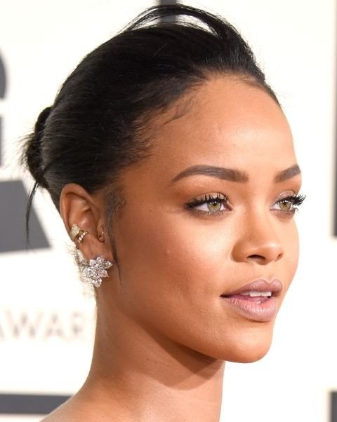 rihanna-piercings-earring-stacks-gettyimages-463029146-1613737824.jpeg